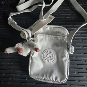 Kipling Silver Mini Crossbody Bag with Plush Monkey Charm